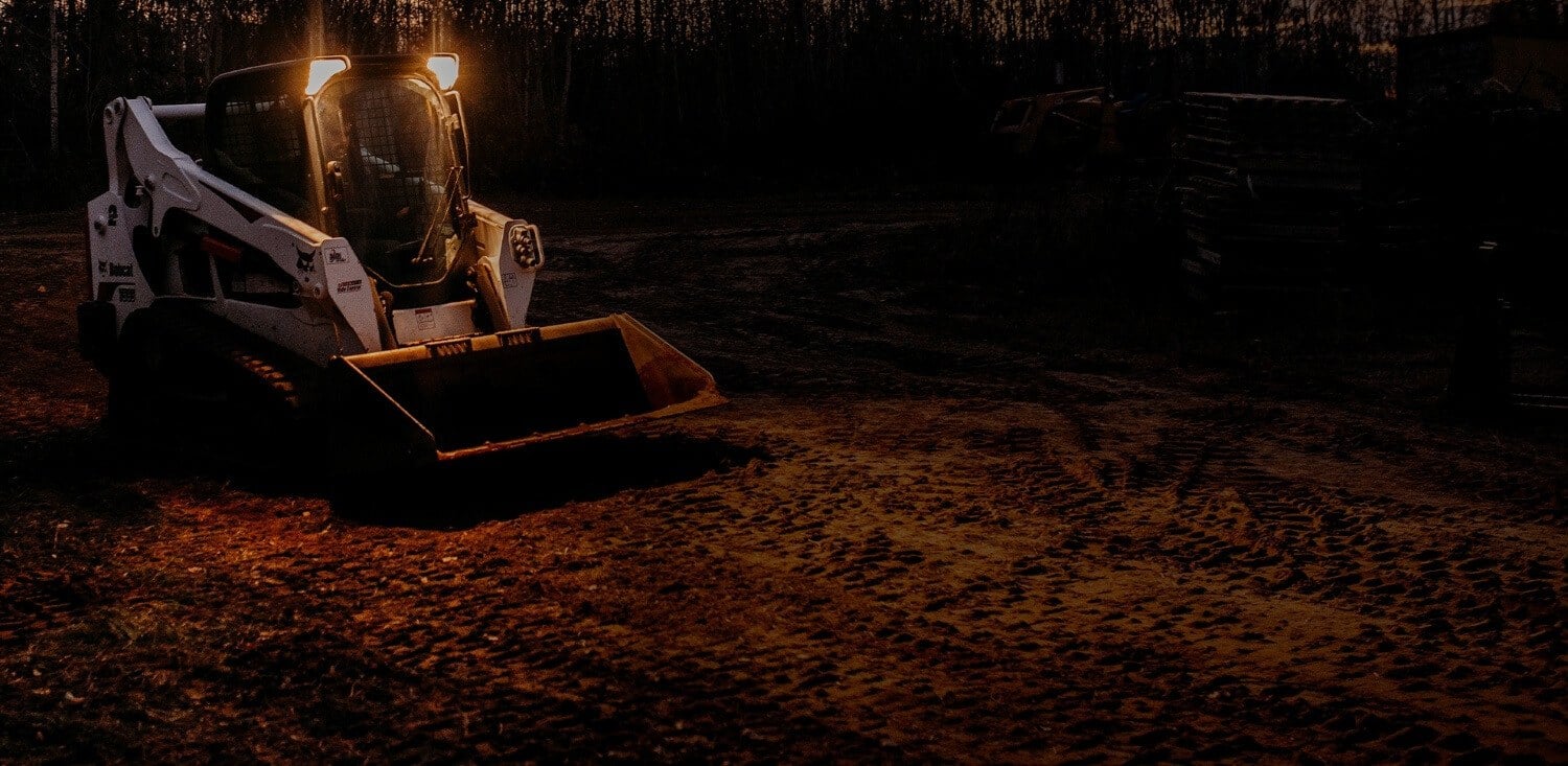 Bobcat Track Skid Steer with Bucket Attachment