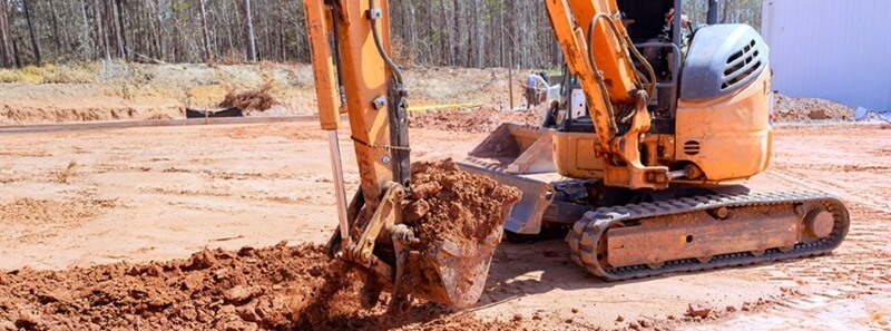 Mini Excavator with Bucket Attachment